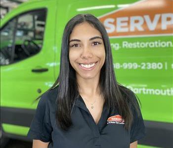 woman in green shirt